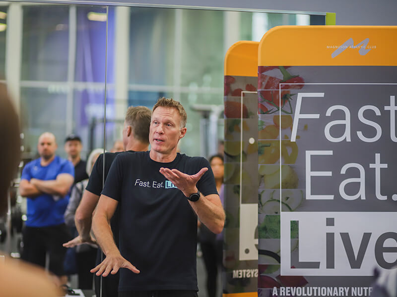 The founder of the MAC Seattle's Fast.Eat.Live nutrition program describes how it works to a group of members